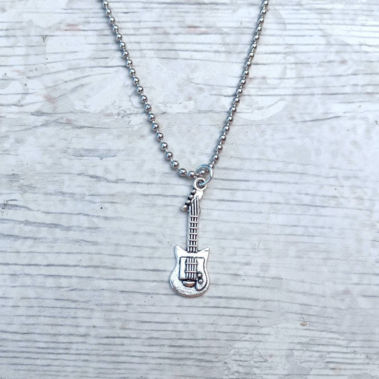 Guitar necklace, guitarist jewellery, jewelry for a music teacher, rocker accessory, steampunk jewellery, musical instrument gift