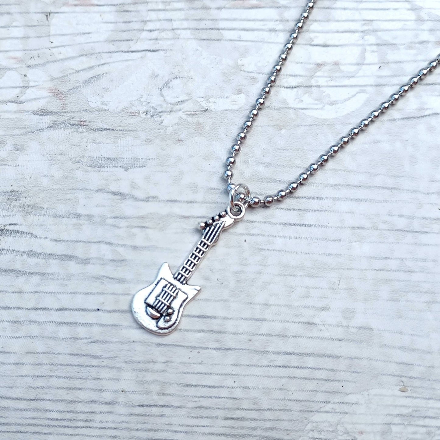 Guitar necklace, guitarist jewellery, jewelry for a music teacher, rocker accessory, steampunk jewellery, musical instrument gift