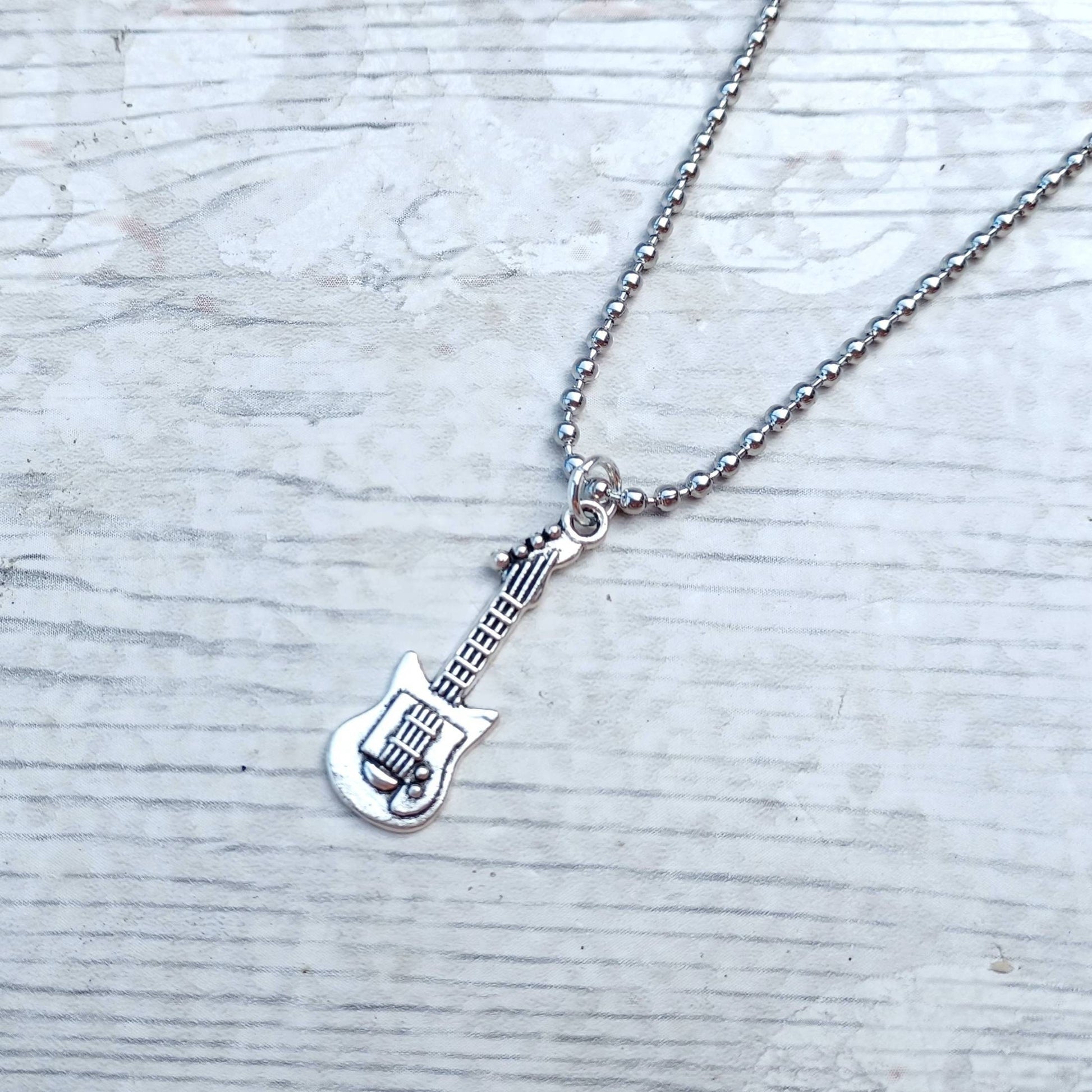 Guitar necklace, guitarist jewellery, jewelry for a music teacher, rocker accessory, steampunk jewellery, musical instrument gift